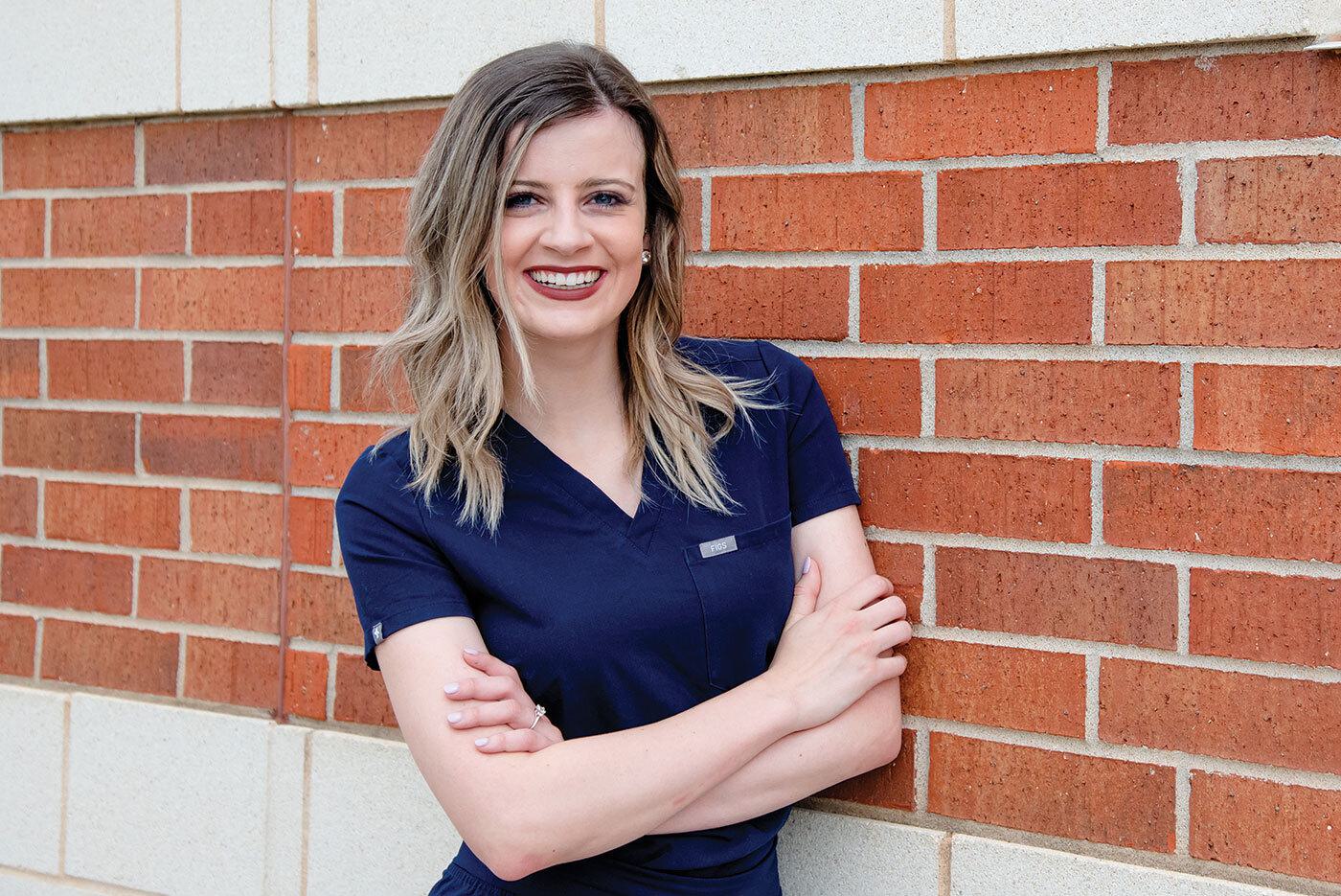 Woman in nursing uniform
