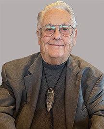 Man in glasses smiling