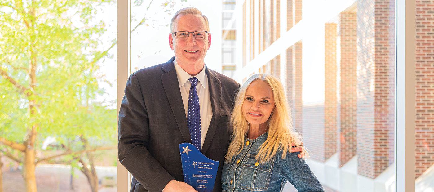 Mark Parker receives the School of Theatre Hall of Honor Award presented by close friend and former student Kristin Chenoweth